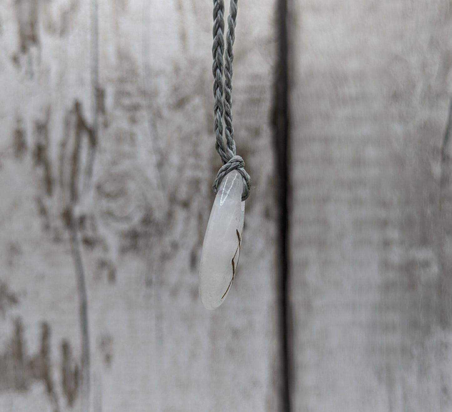 ingwaz quartz palm rune stone pendant.