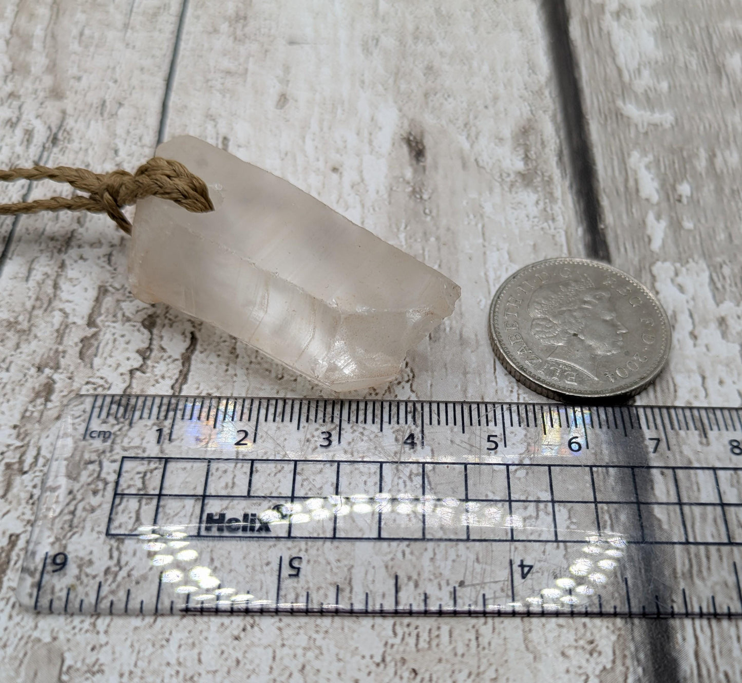 chunky quartz point stone pendant.