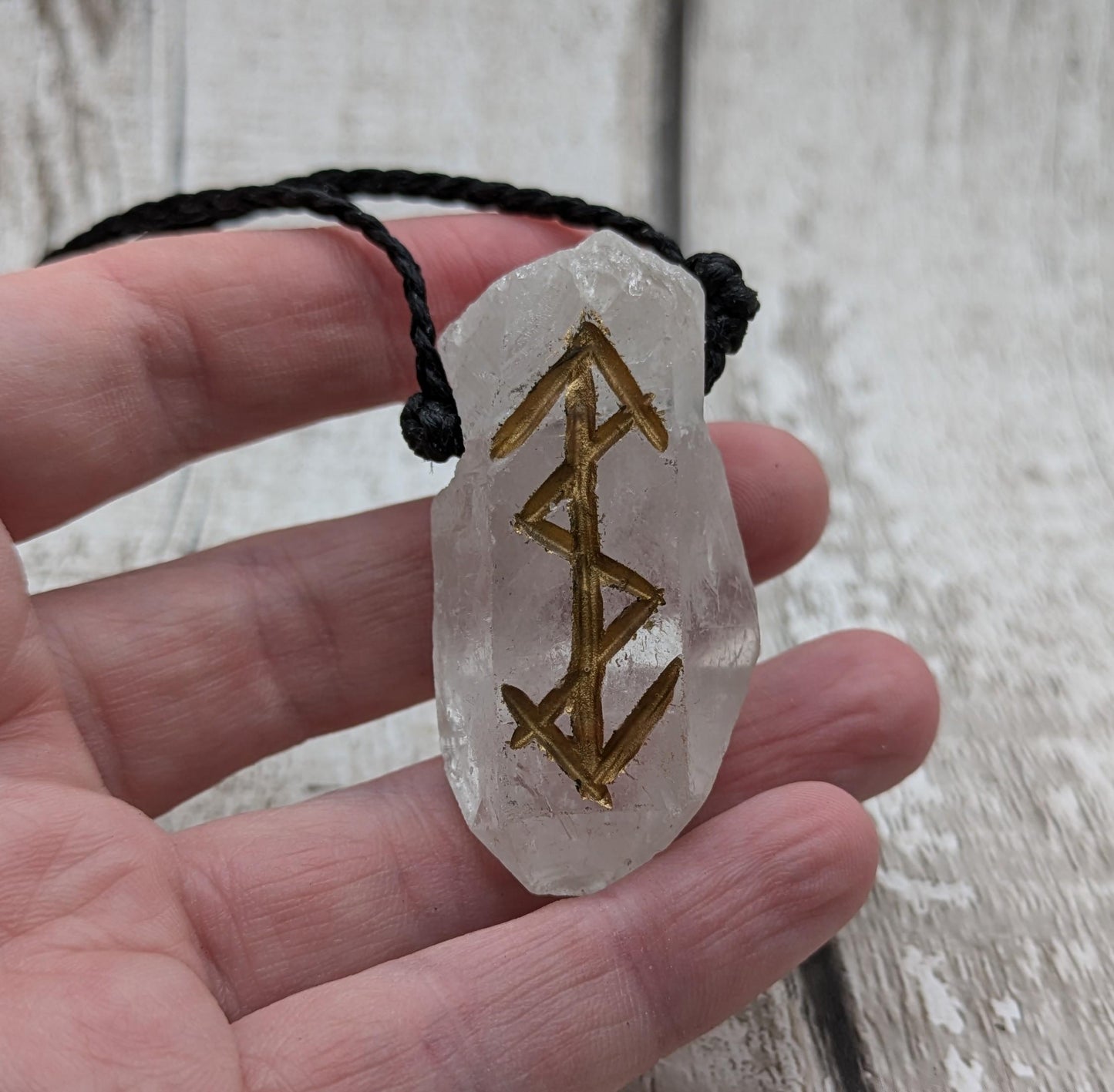 quartz crystals point bind rune empowerment pendant.