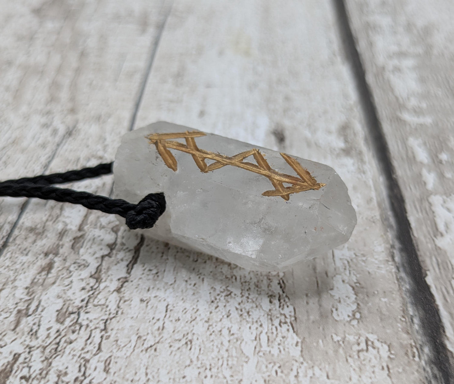 quartz crystals point bind rune empowerment pendant.