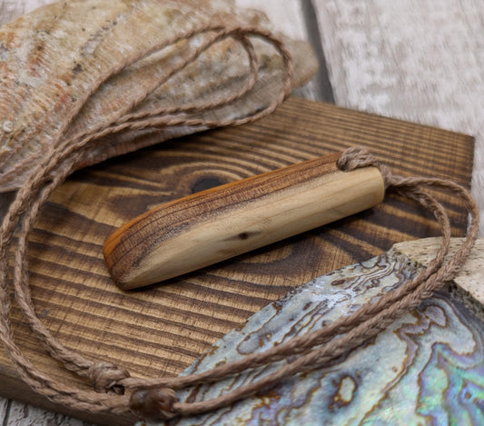 yew wood carved toki styled pendant - Handcrafted jewellery.