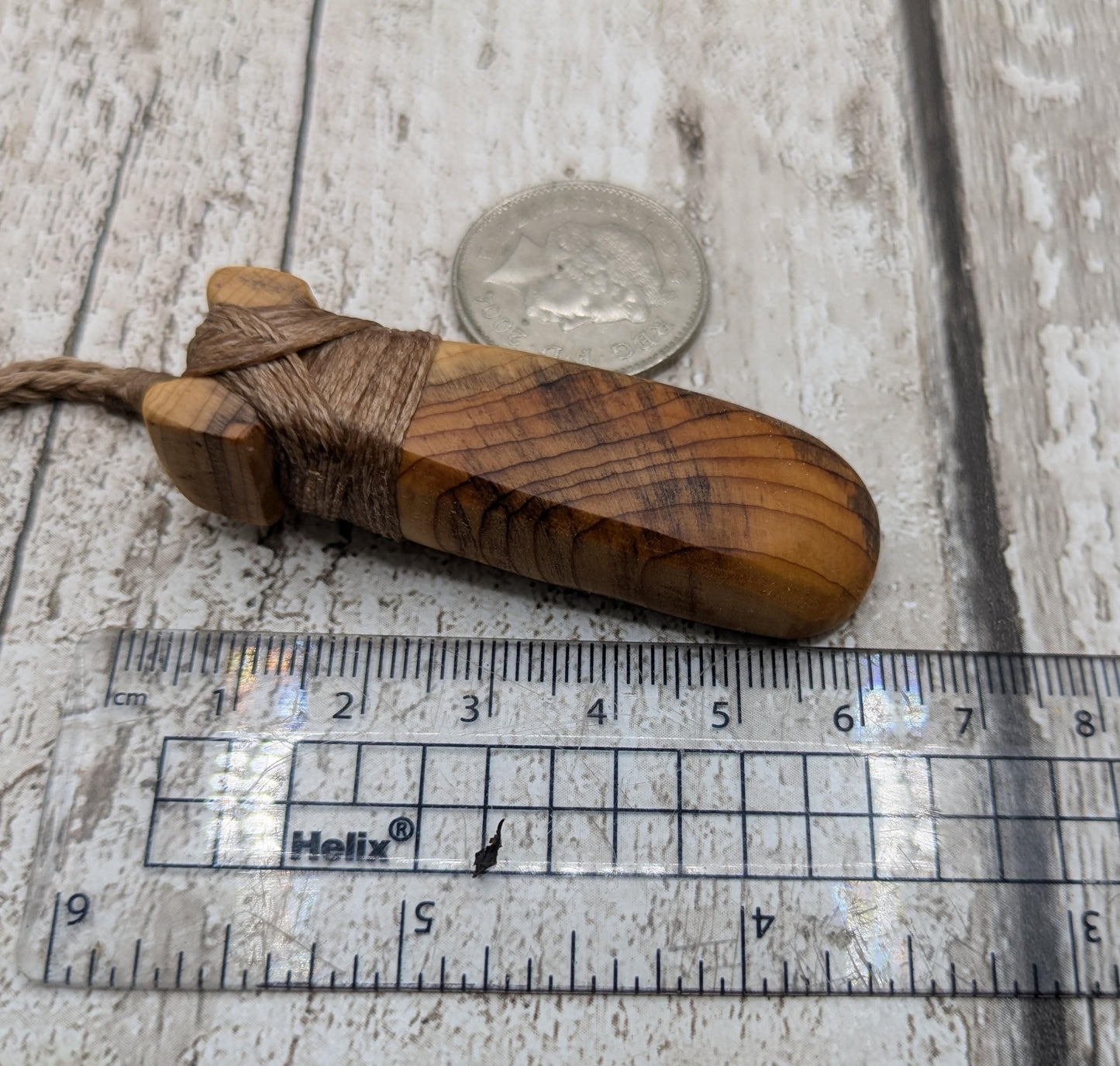 yew wood hey took adze pendant.
