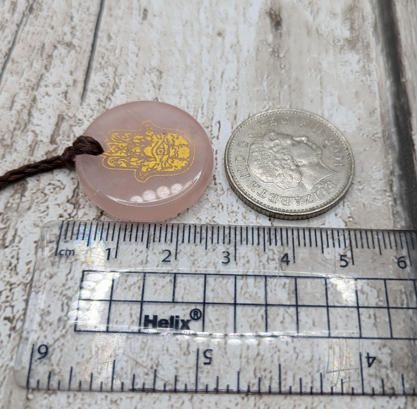 Rose quartz Hamza hand pendant.