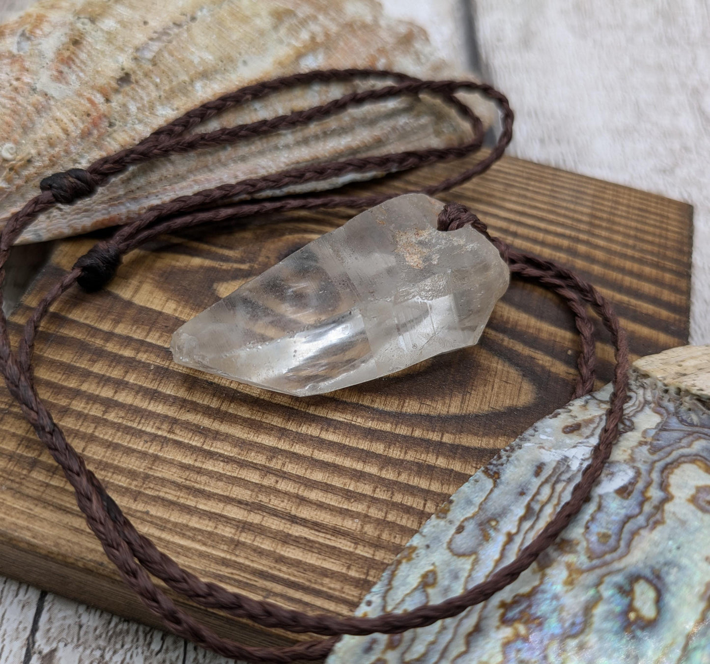 clear quartz crystal point pendant.