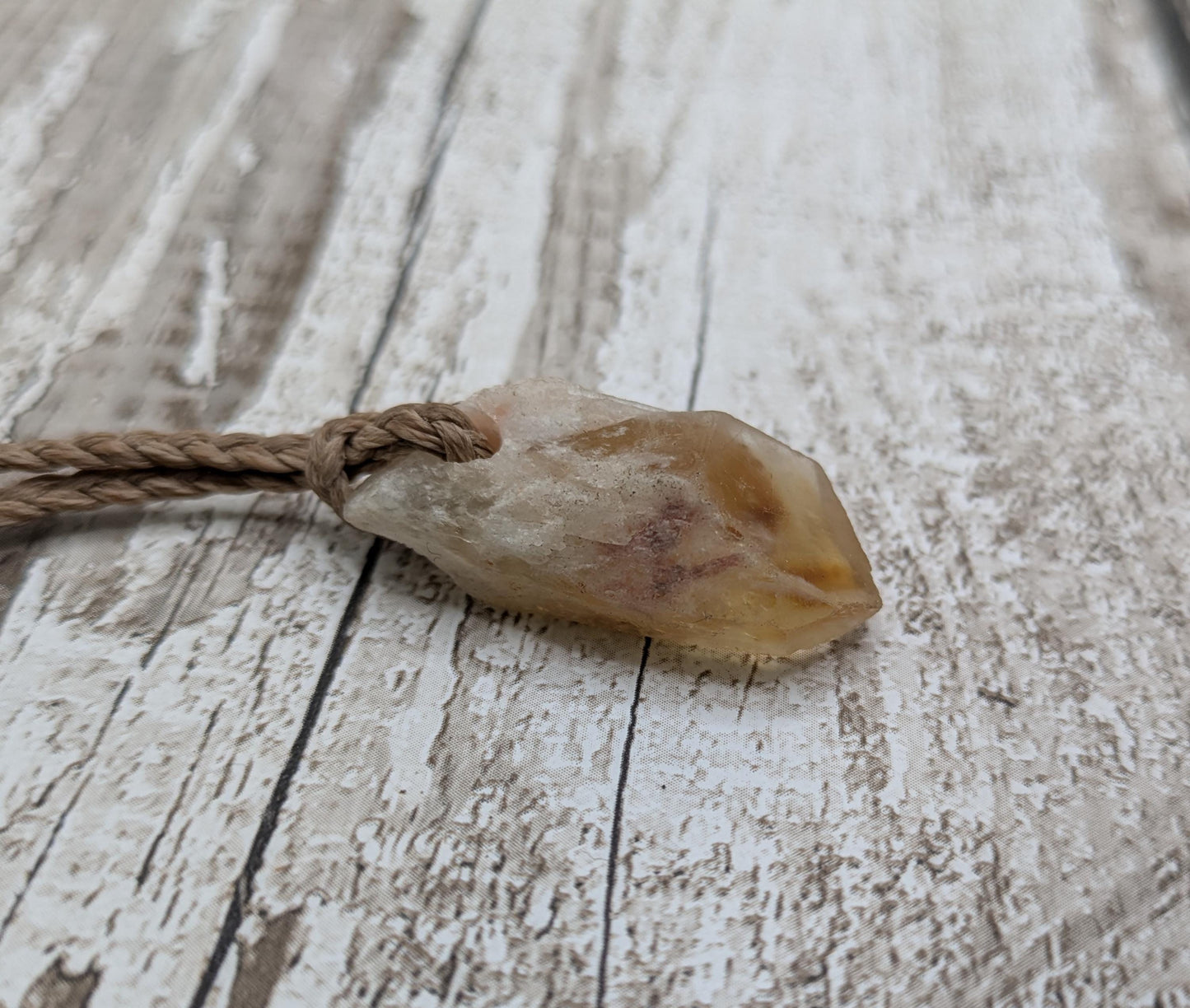 heat treated citrine crystal point pendant.