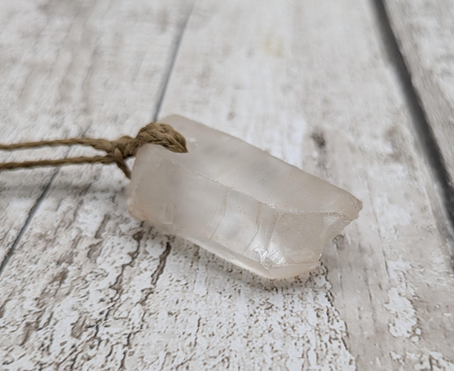 chunky quartz point stone pendant.