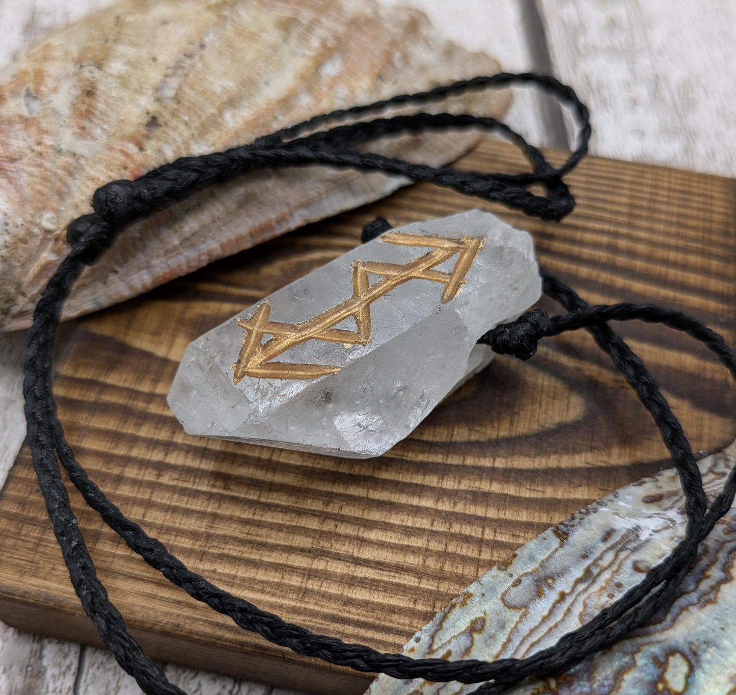 quartz crystals point bind rune empowerment pendant.