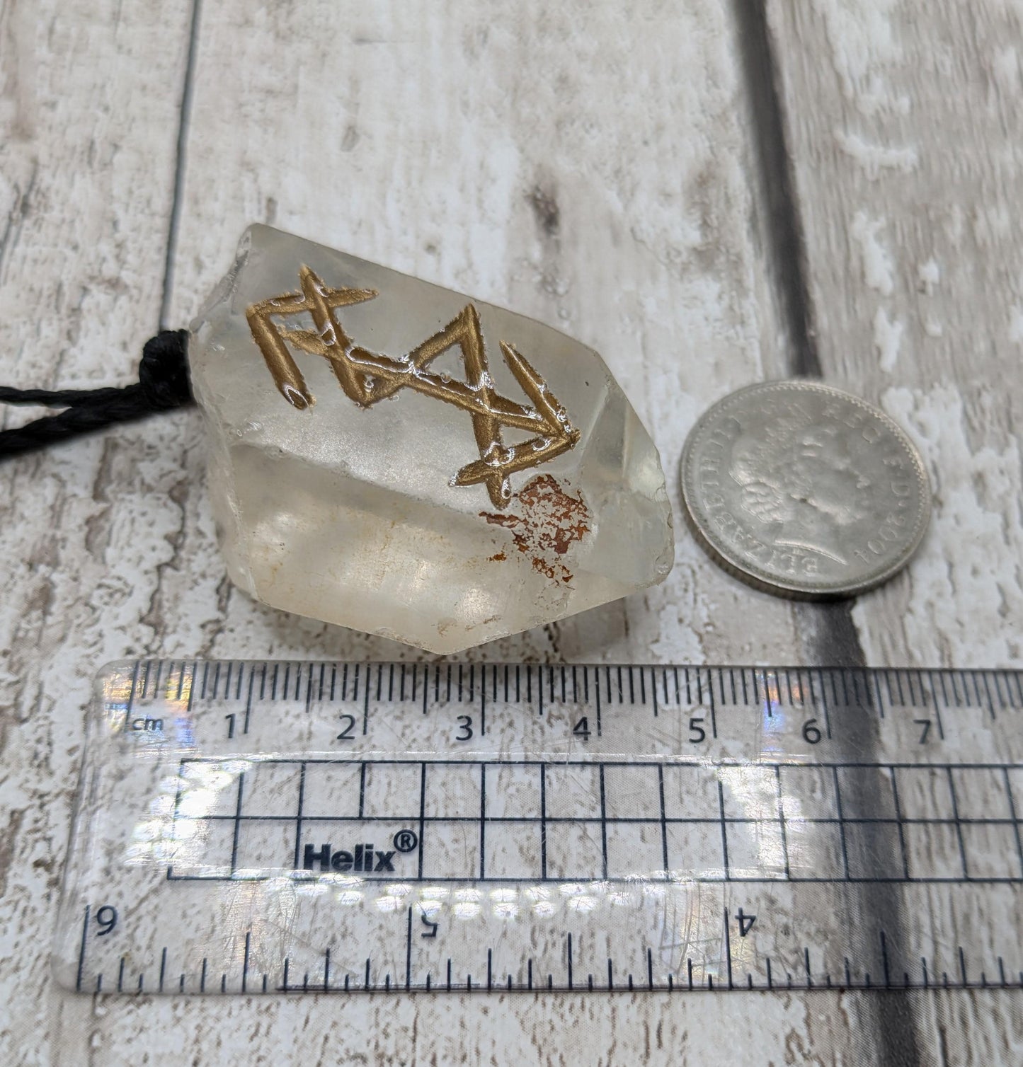 clear crystal point bind rune stone pendant.