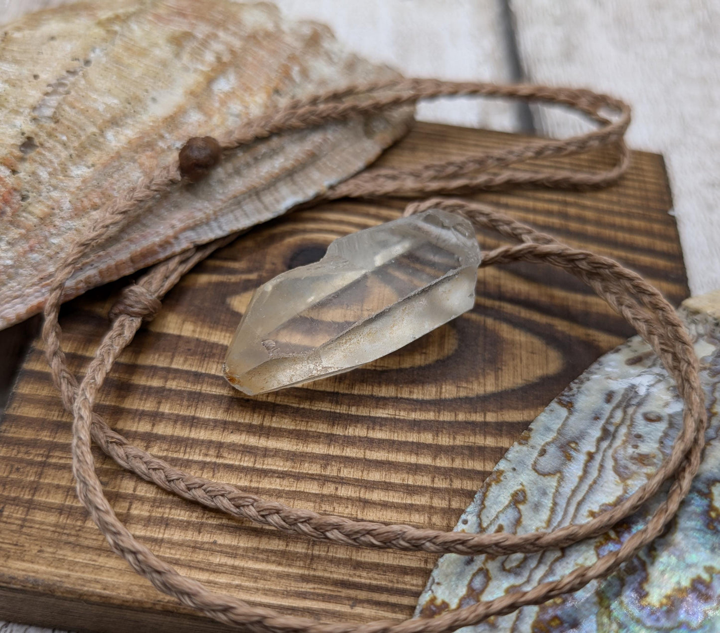 clear quartz crystals point pendant.