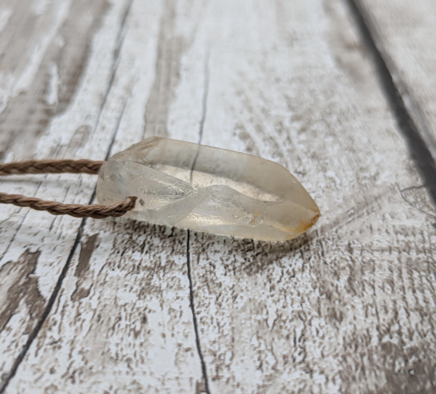 clear quartz crystals point pendant.