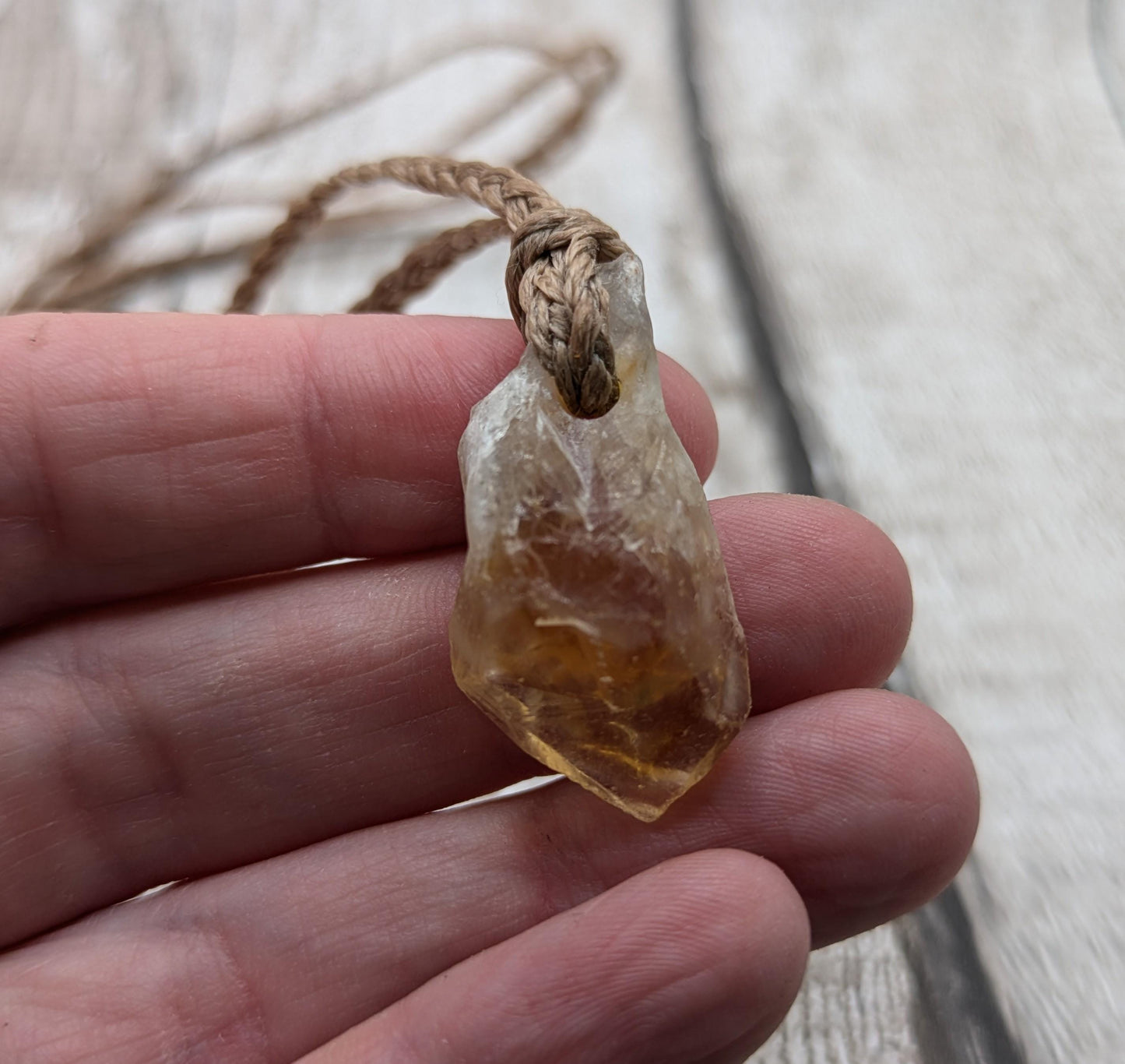 heat treated citrine point pendant.