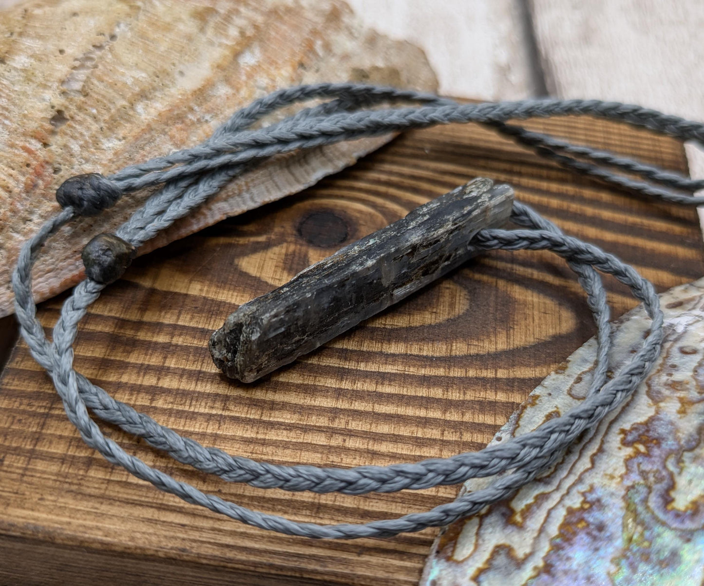 Raw kyanite pendant.