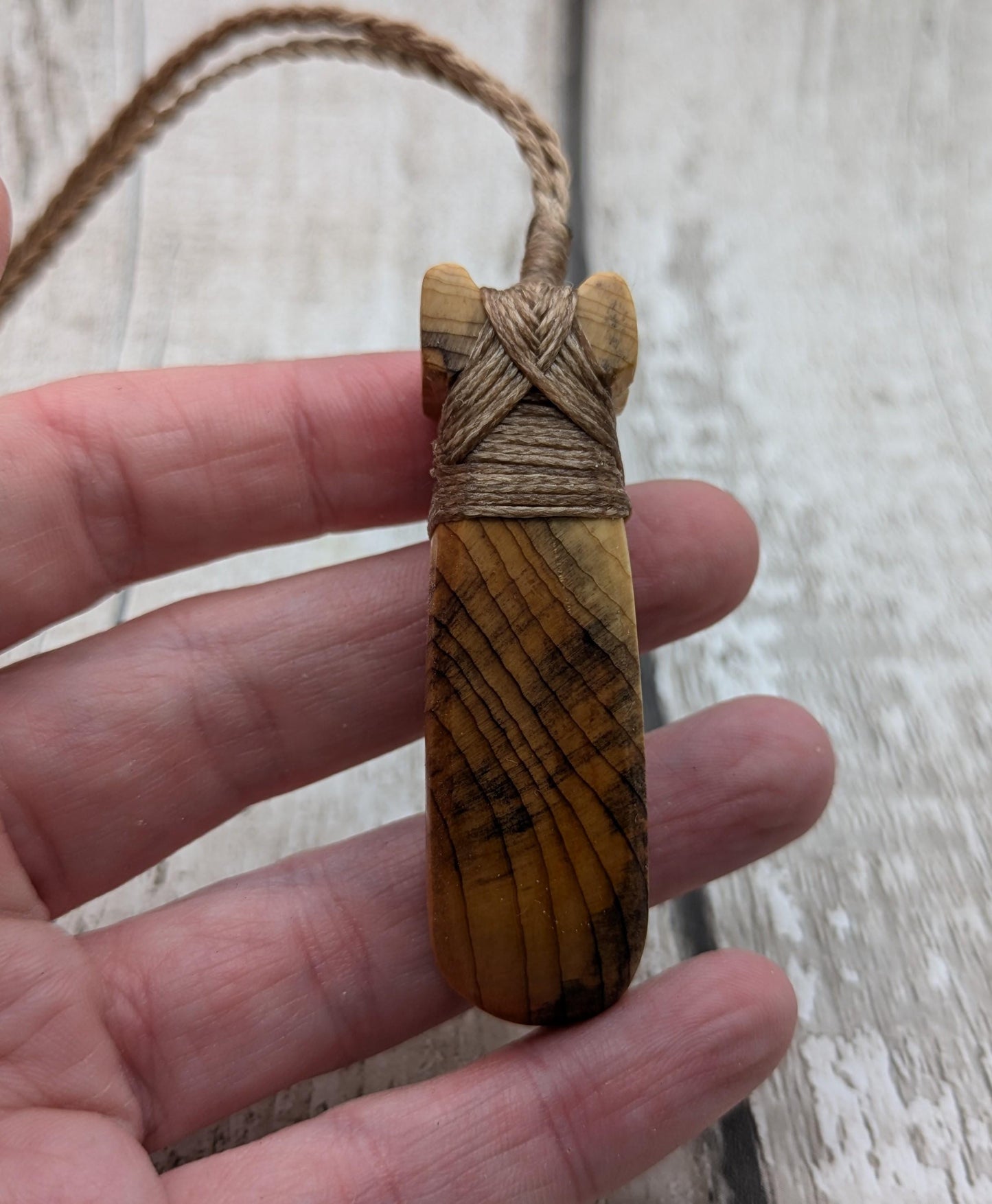 yew wood hey took adze pendant.