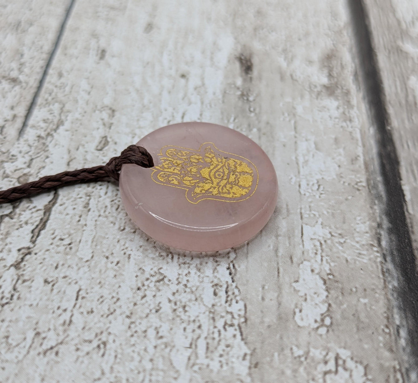 Rose quartz Hamza hand pendant.