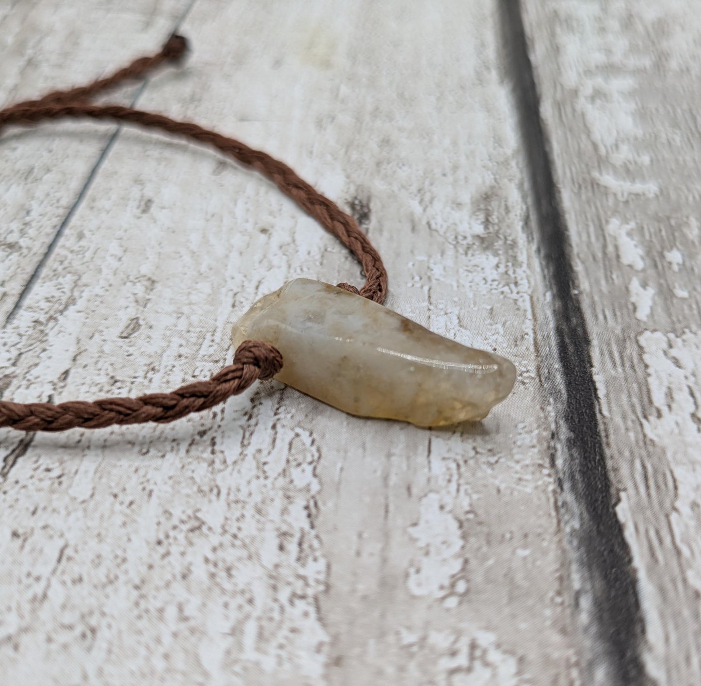 citrine stone macrame adjustable bracket.