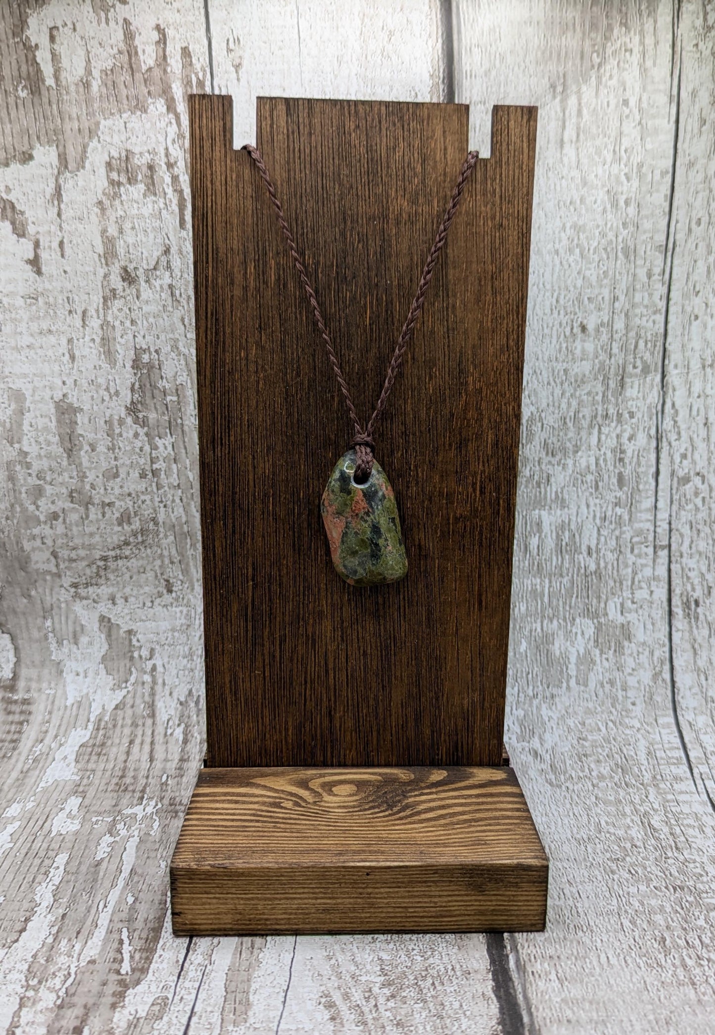 unakite tumbled stone pendant.