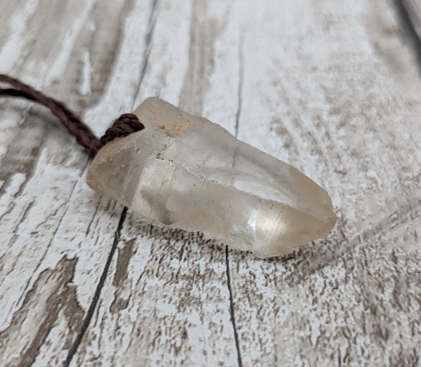 clear quartz crystal point pendant.