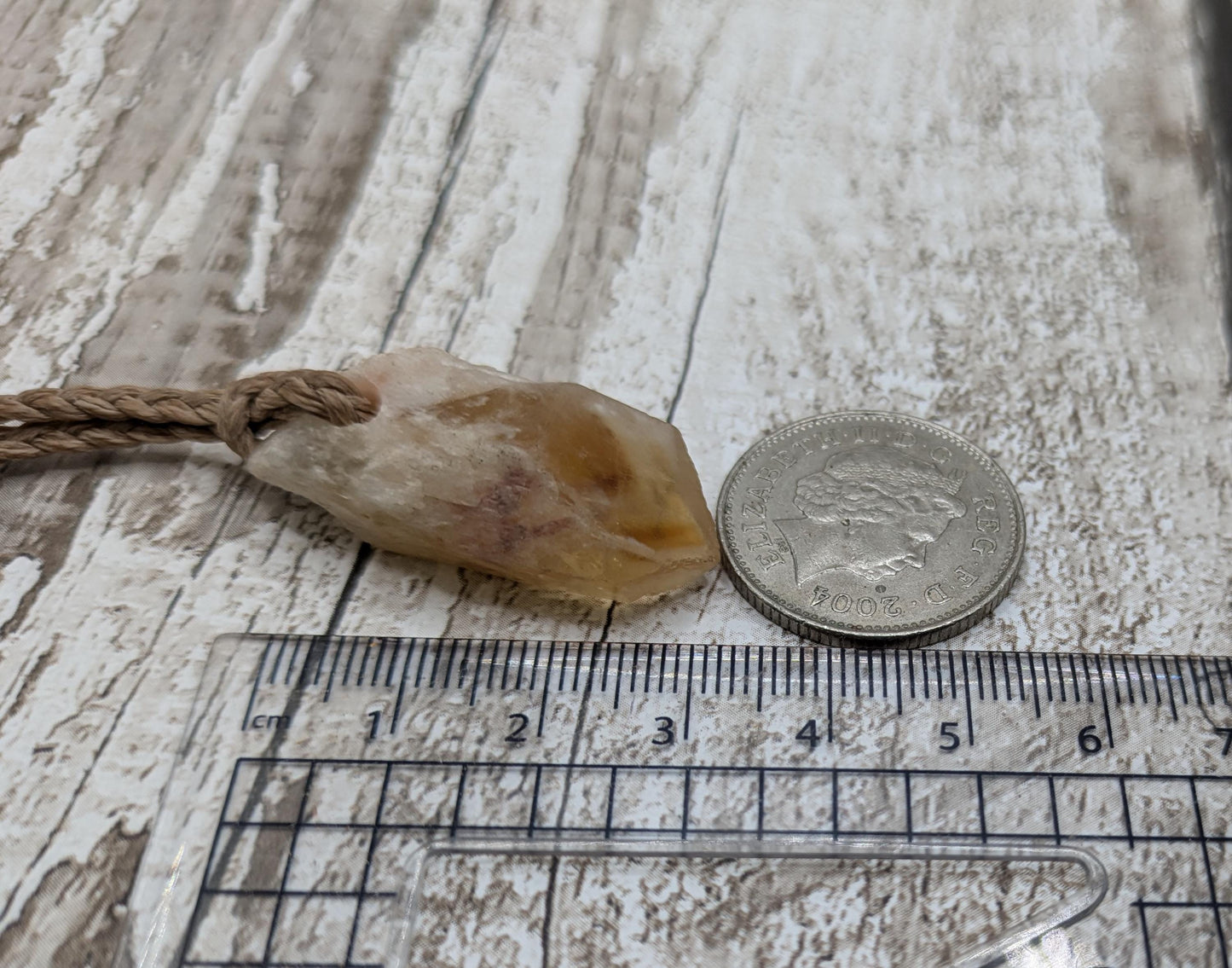 heat treated citrine crystal point pendant.