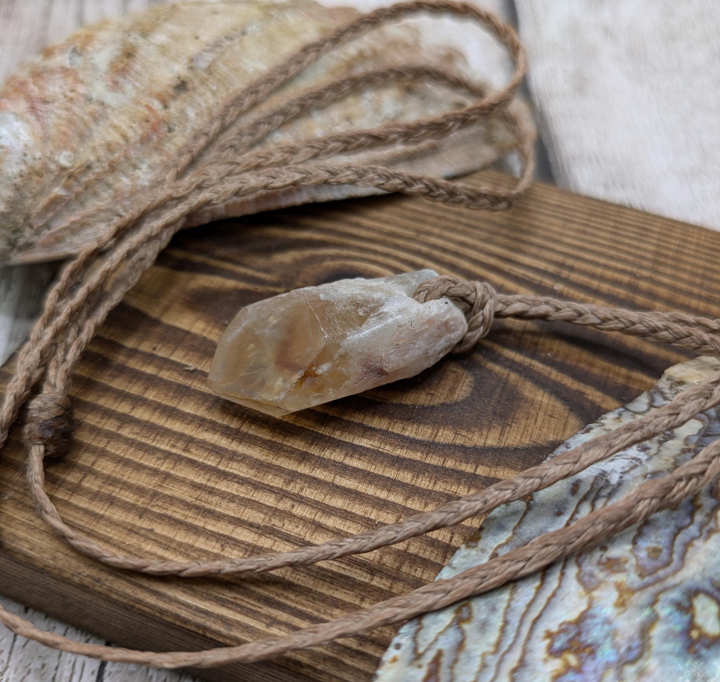 heat treated citrine crystal point pendant.