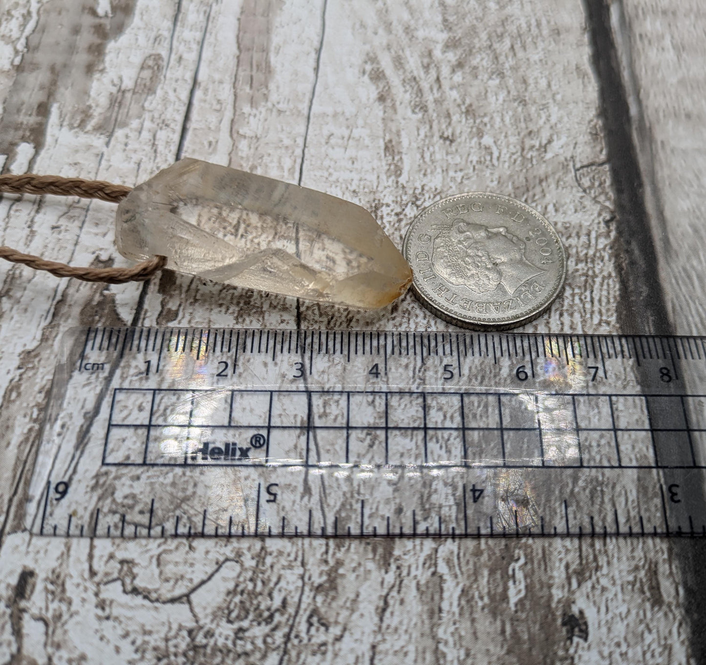 clear quartz crystals point pendant.