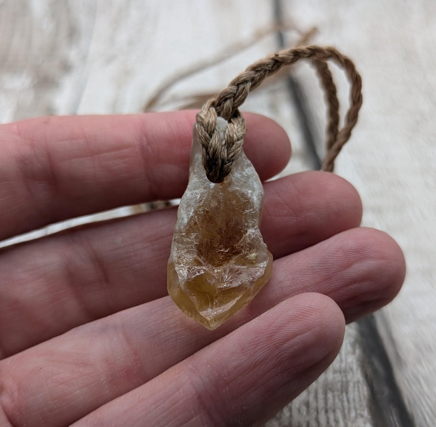 heat treated citrine point pendant.