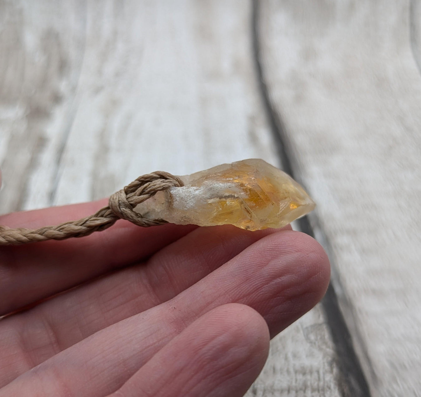 heat treated citrine point pendant.