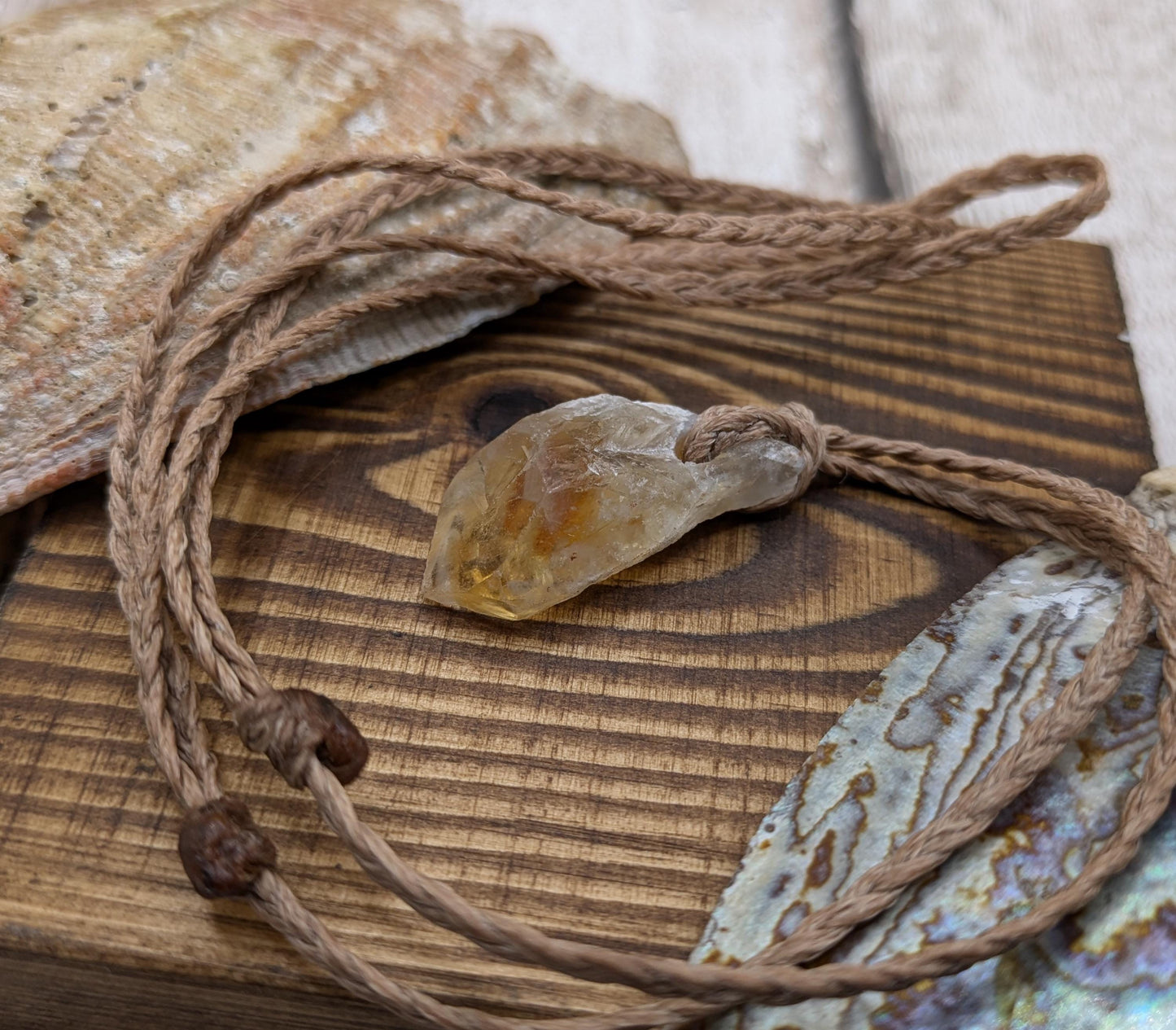 heat treated citrine point pendant.