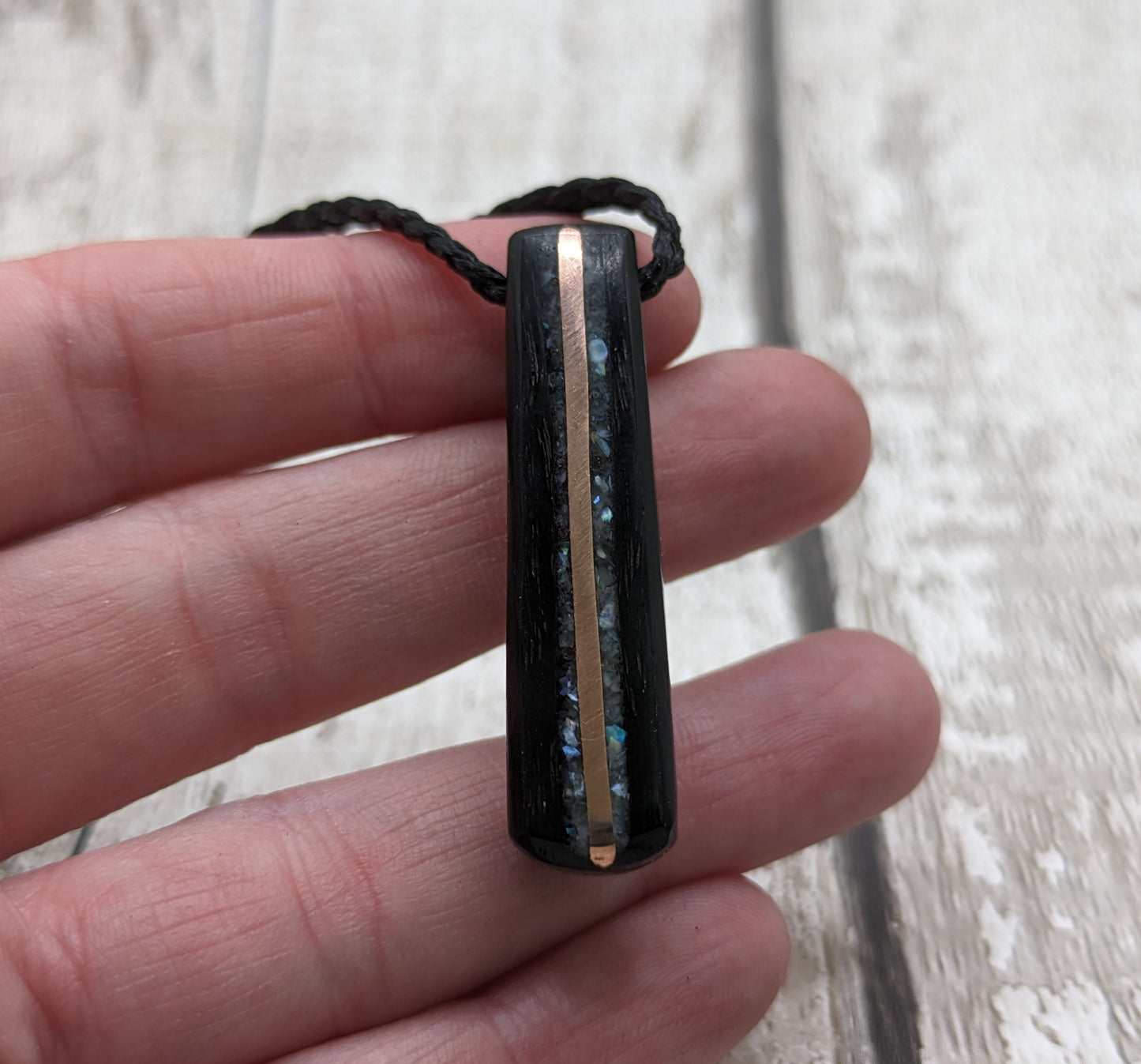 Fenland bog oak roimata pendant with mussel shell and copper wire