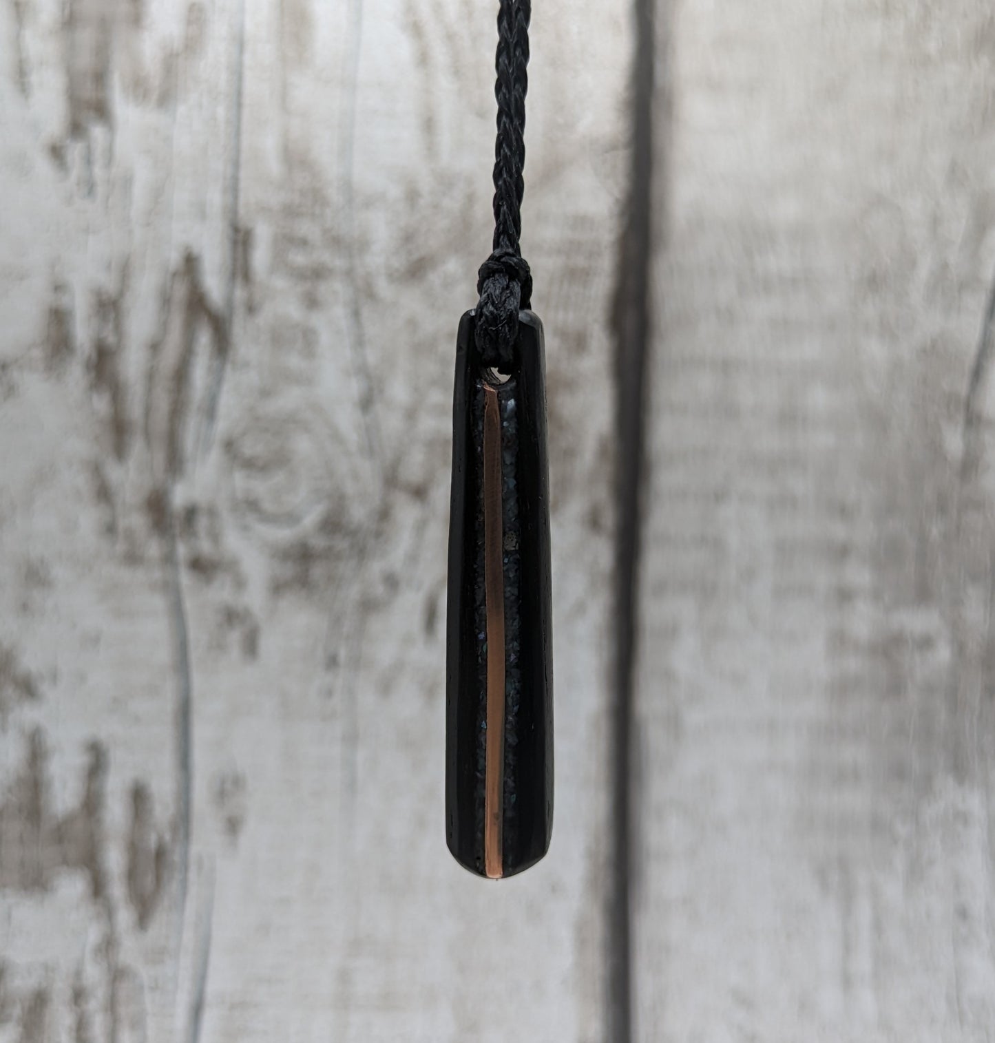 Fenland bog oak roimata pendants with mussel shell and copper wire