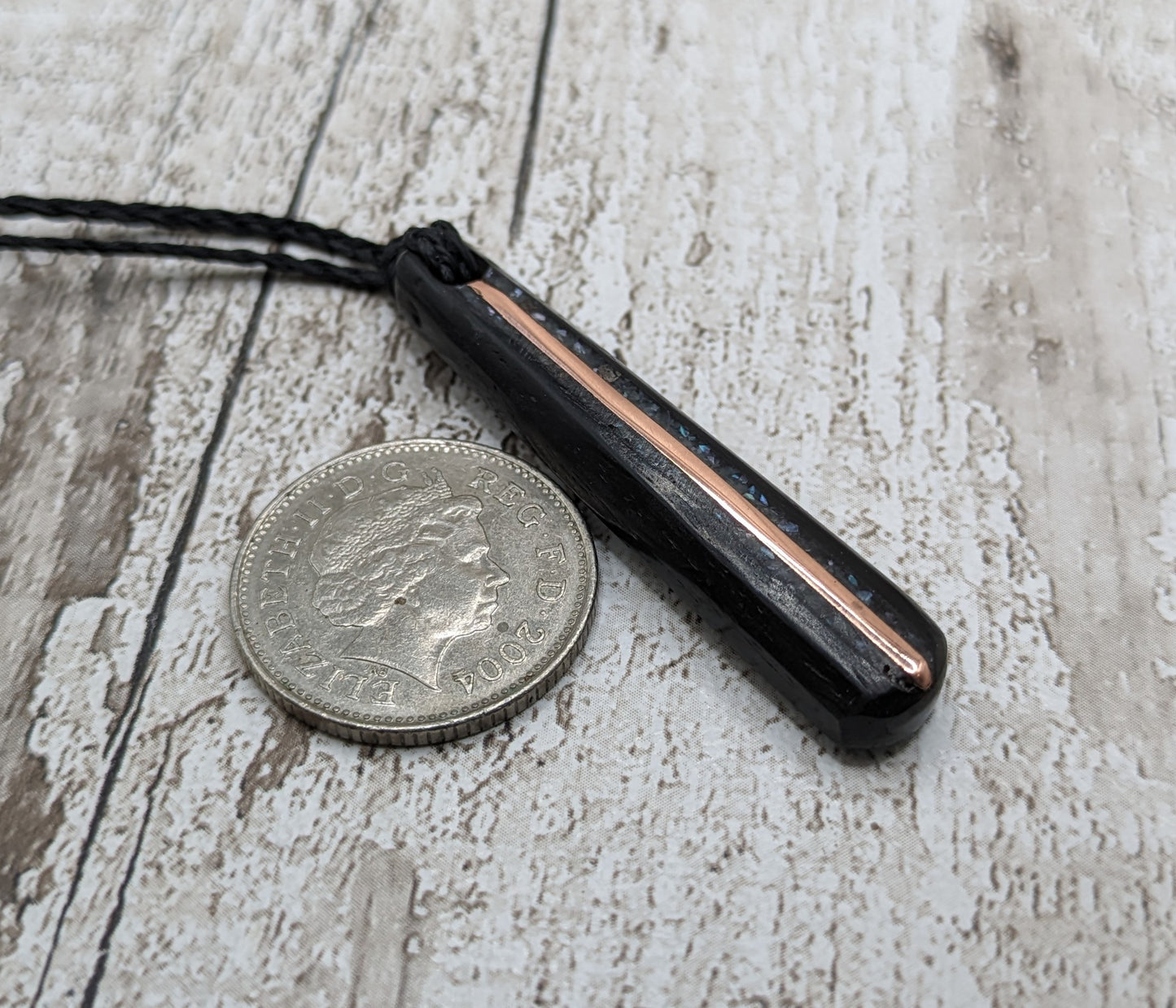 Fenland bog oak roimata pendants with mussel shell and copper wire