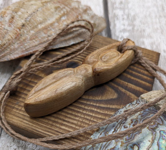 Maple wood carved goddess pendant