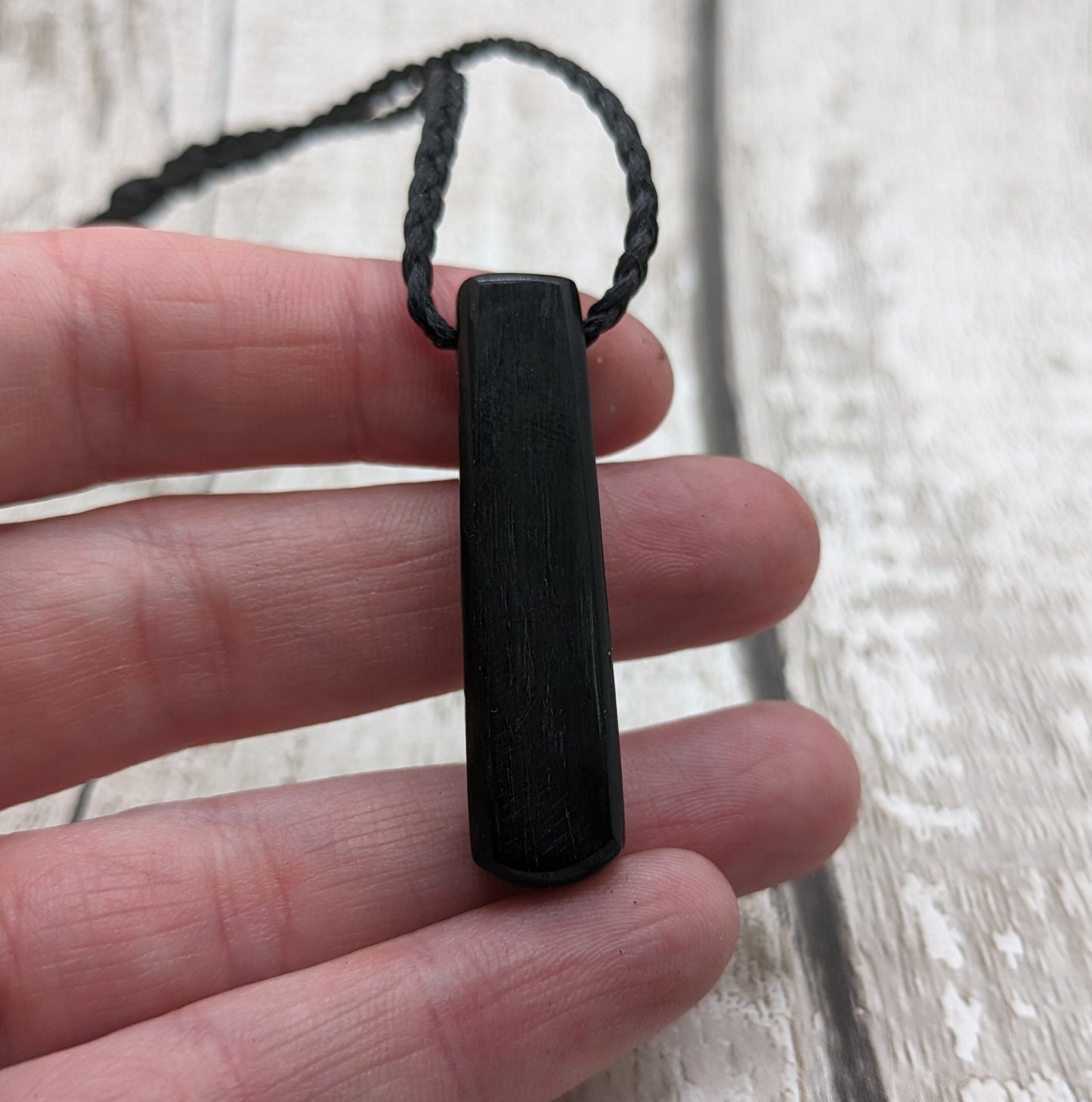 Fenland bog oak roimata pendant with mussel shell and copper wire