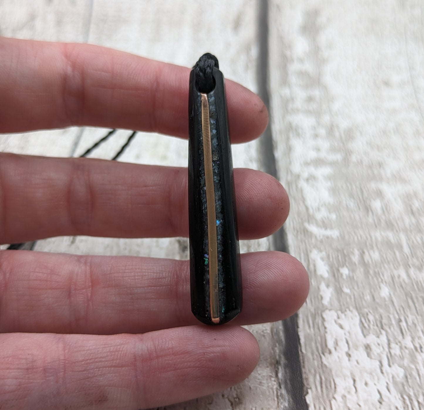 Fenland bog oak roimata pendants with mussel shell and copper wire