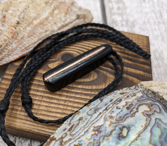 Fenland bog oak roimata pendant with copper wire and abalone shell.