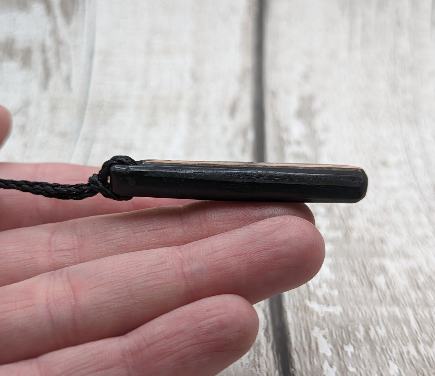 Fenland bog oak roimata pendants with mussel shell and copper wire