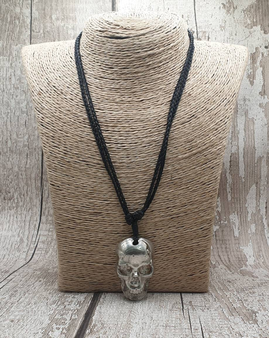 Solid pewter skull casting unisex pendant.