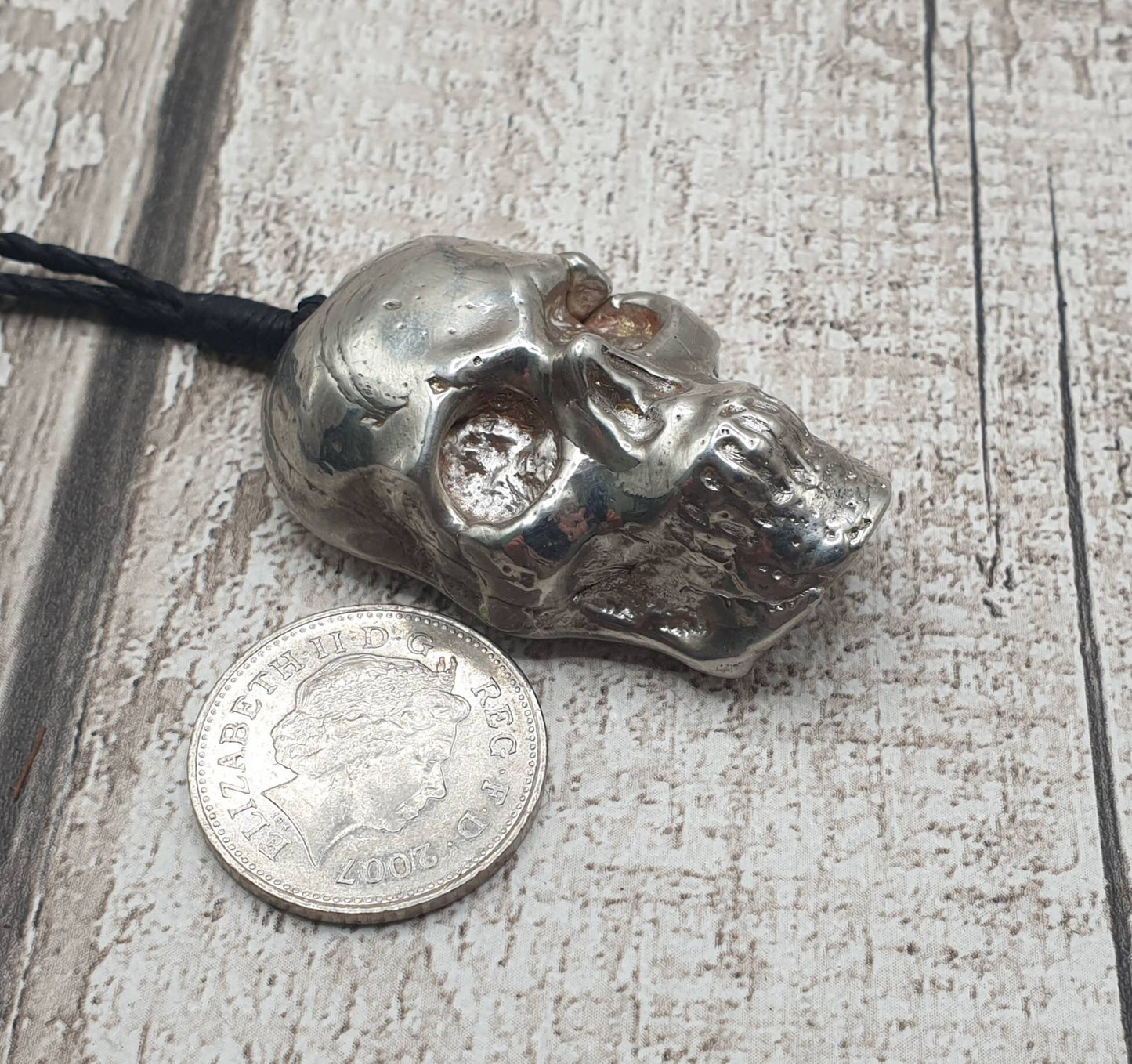 Solid pewter skull casting unisex pendant.