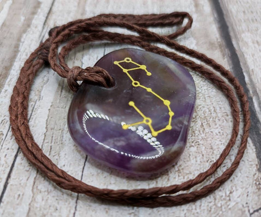 Amethyst semi precious stone Pisces star sign unisex pendant.