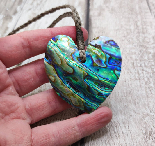 New Zealand rainbow paua abalone shell heart shaped unisex pendant.