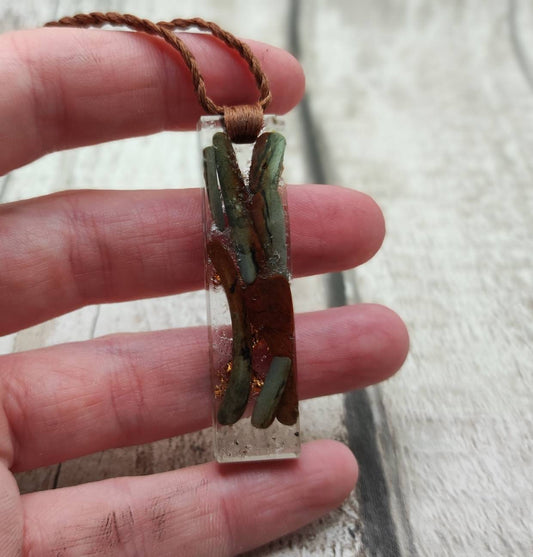 Australian nephrite Jade in epoxy resin with copper and Italian silver leaf.