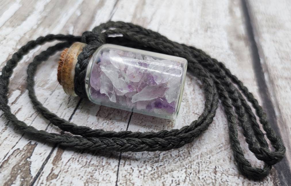 Amethyst semi precious stone cluster glass bottle pendant.