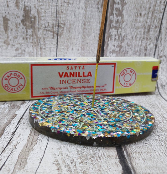 Glitter filled runic divination compass board incense holder.