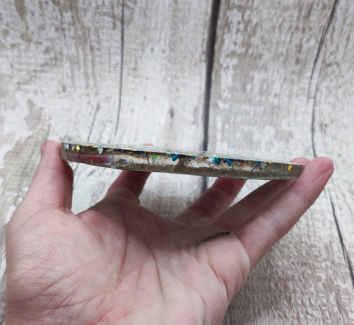 Glitter filled runic divination compass board incense holder.