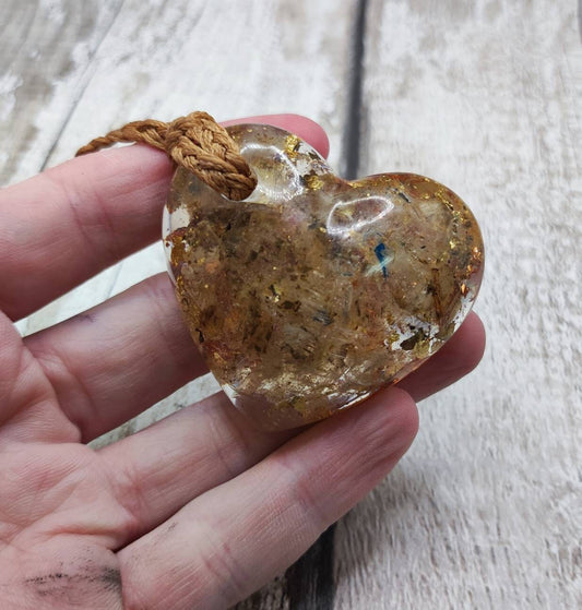 Sheppy selenite in epoxy resin heart shape with brass leaf.