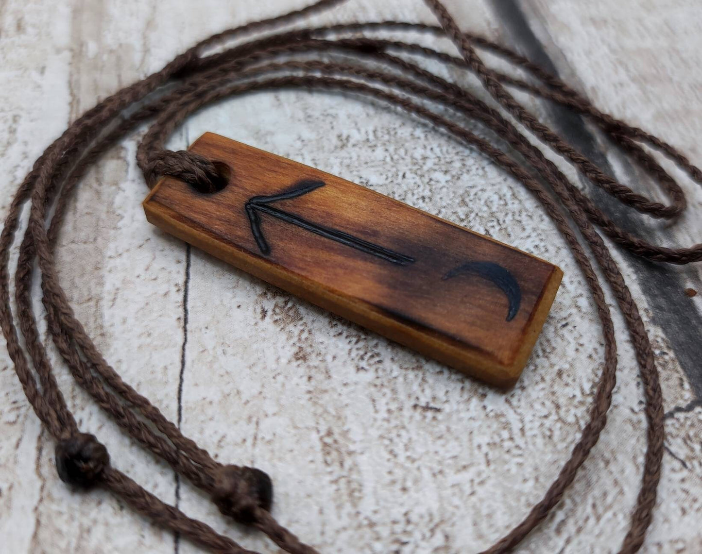 Rimu wood veneer, tiwaz rune pendant.