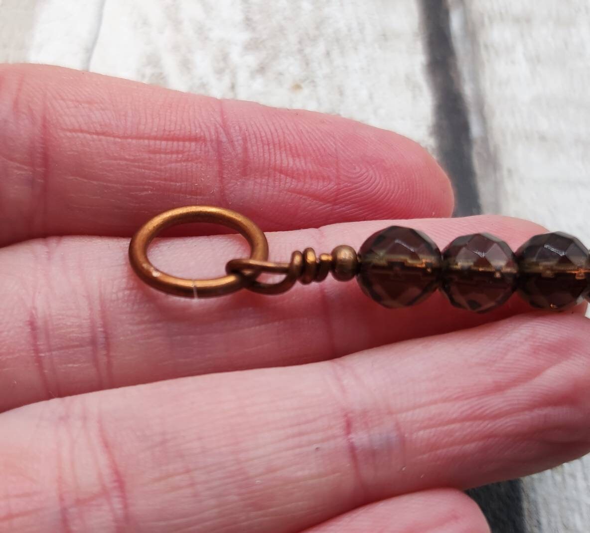 Smokey quartz, faceted bead, copper bracelet charm.