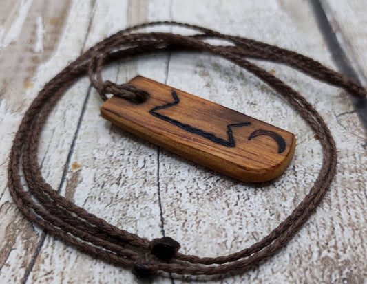 Rimu wood veneer, perthrow rune unisex pendant.