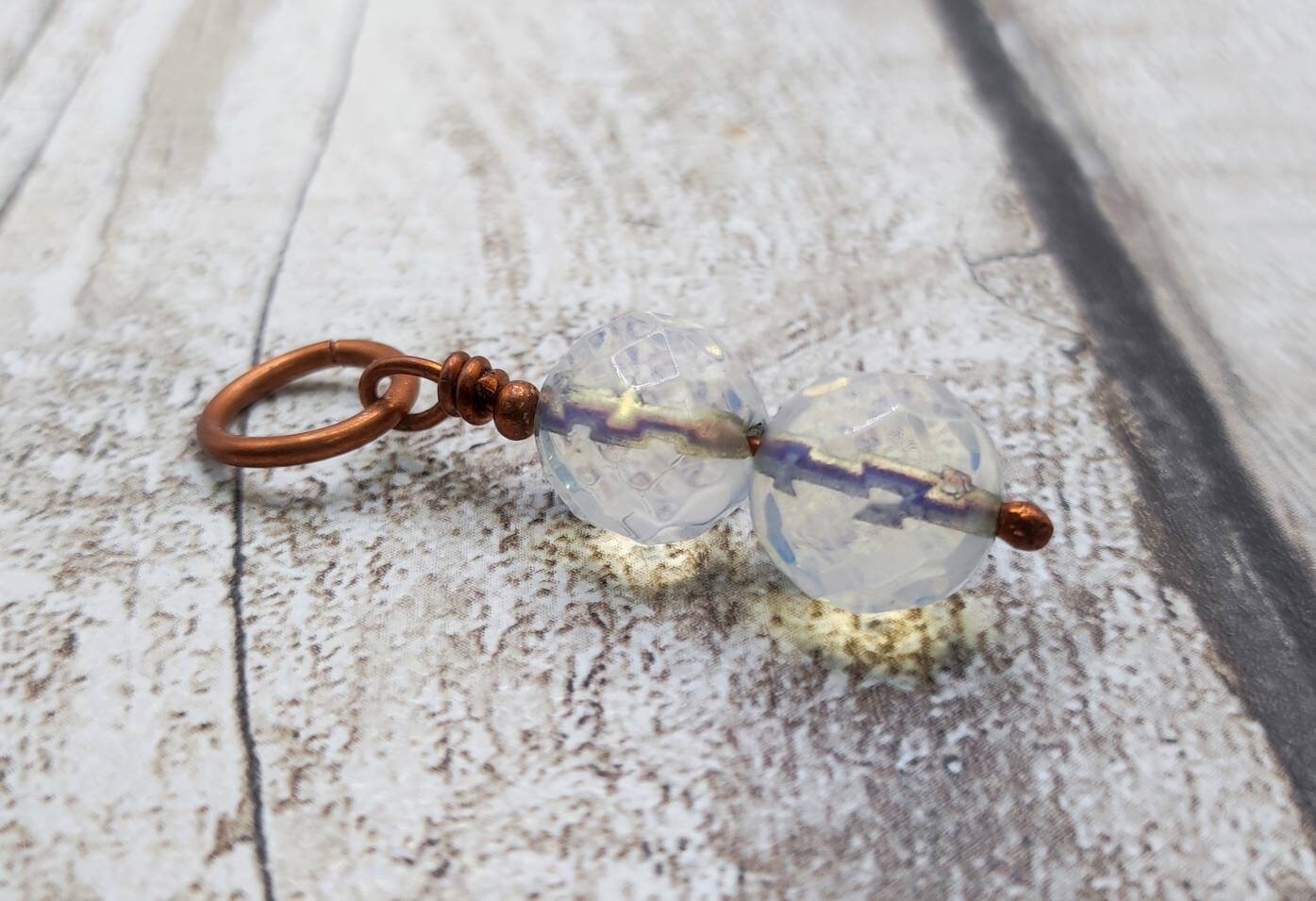 Man made opal glass, copper bracelet charm.