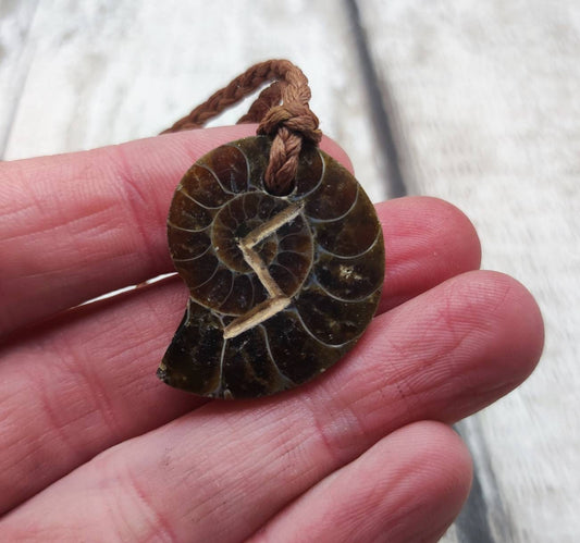 Sowelu Ammonite rune stone pendant.