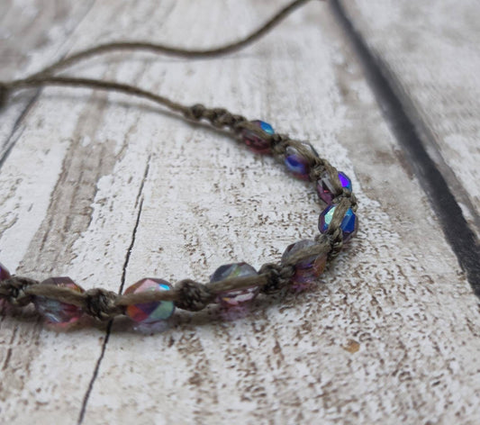 Glass beaded macramé woven adjustable bracelet.